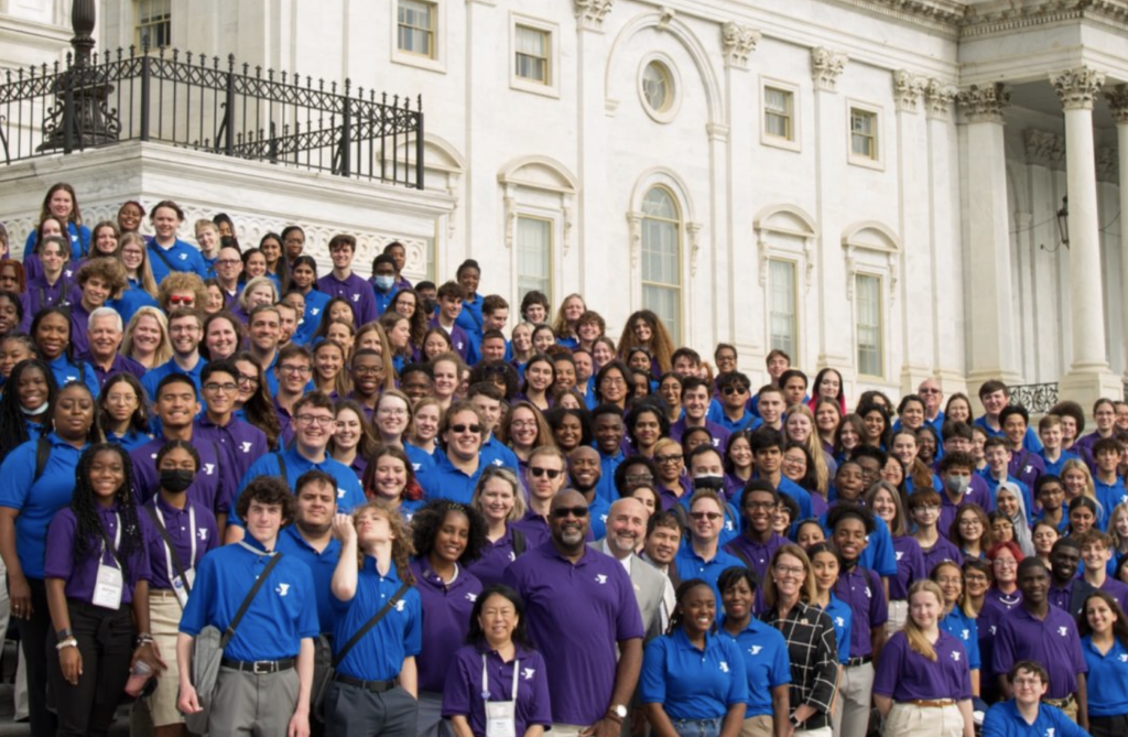 Group of students and instructors on steps in front of building in D.C.